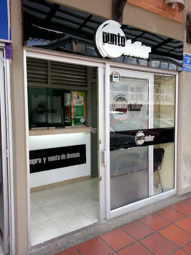 banco Punto Dollar Centro Comercial Granada Hills Local 104, Casa De Cambios